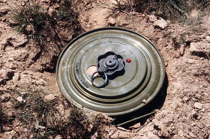 Land mine on dry ground